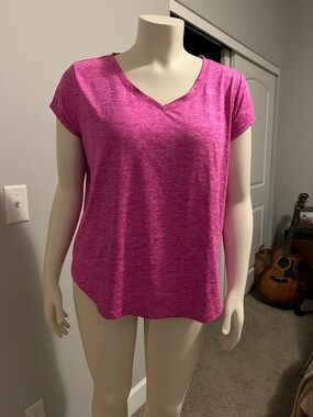 Hot pink dry fit type shirt…possibly XL